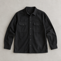one black men's long-sleeve button-front overshirt, two symmetrical chest patch pockets with flaps, classic collar, straight hem